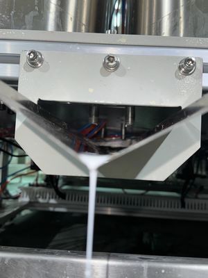 Ligne de revêtement rotatif à grande vitesse respectueuse de l'environnement pour des emballages moulés en pâte à papier durables - revêtement à base d'eau de précision