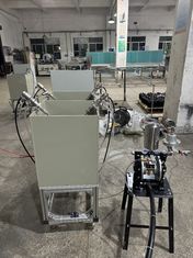 Machine automatique à double station de revêtement par rotation de moules de pâte pour l'étanchéité alimentaire des emballages écologiques